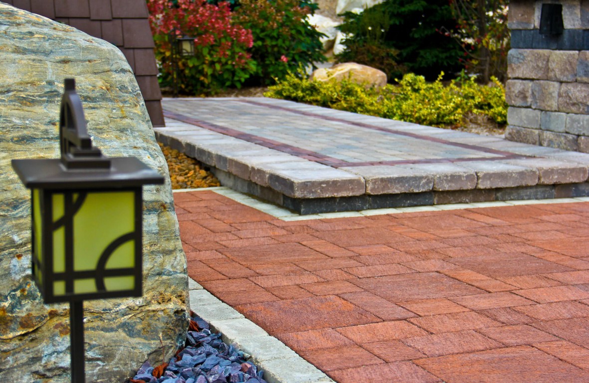Custom natural stone patio and paver installation in Ontario, CA